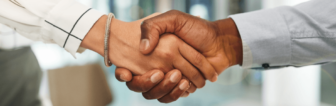 Business colleagues shaking hands